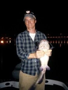 Hoping we had hooked a lunker bass at night on Lady Bird Lake, but this hefty catfish still gave us some fun in the dark.