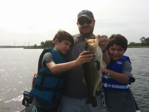 Admiring their dad's catch. PowerTeam Lures Tickler on a split-shot rig duped this one.