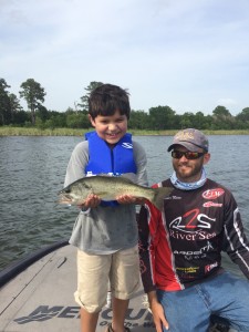These kids wanted to learn how to fish with lures, so I tied on a PowerTeam Lures Tickler on some PTL Pea Heads, told them to cast off the back of the boat, and just hold on!