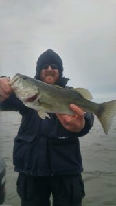 Getting a tug on your line will put a smile on your face in even the coldest, nastiest weather.