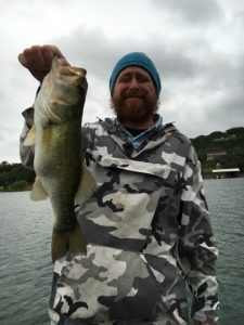 All smiles with this bass that smashed a topwater bait on Lake Travis